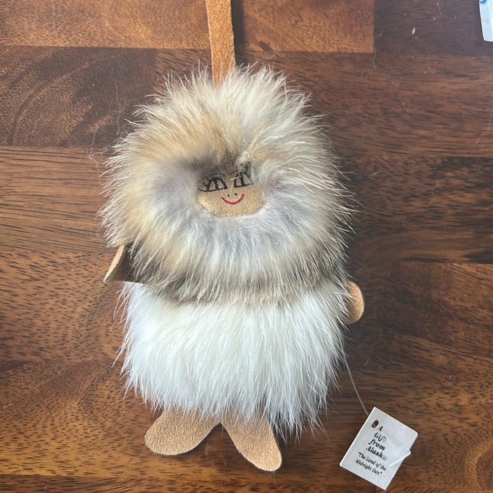 Eskimo doll charm